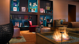 Living room fireplace bookshelf couch - vibrant color scheme free wallpaper