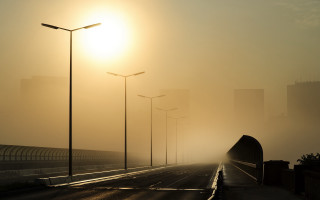 Foggy street city tall buildings - volumetric fog free wallpaper