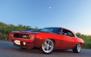 Red car parked road field - don eddy free wallpaper