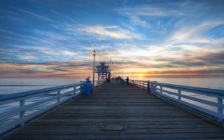 Pier lighthouse trashcan sunset clouds - a light house free wallpaper