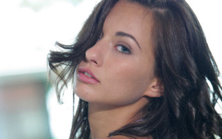 Serious woman long hair marble - pretty face free wallpaper