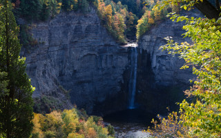Waterfall canyon trees autumn night - a waterfall in the middle of it free wallpaper