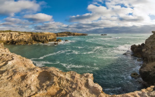 Rocky cliff ocean cloudy day - a rocky cliff free wallpaper