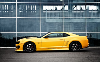 Yellow sports car glass wall - the side of the car free wallpaper for desktop