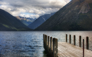 Wooden dock lake mountains clouds - a wooden dock free wallpaper for desktop