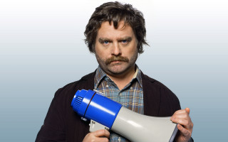 Man holding blue white megaphone - a black jacket free wallpaper