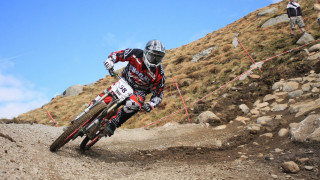 Dirt bike hill rocks grass - full round face free wallpaper