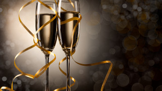 Champagne flutes gold ribbon bokeh - a gold ribbon free wallpaper