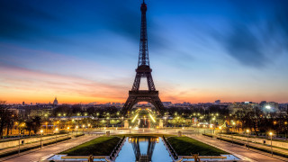 Eiffel tower night lights reflection - free sunset wallpaper