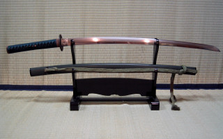 Sword stand knife bronze sculpture - a stand free wallpaper