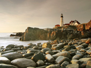 Lighthouse rockyshore ocean landscape military - a rocky shoreline free wallpaper