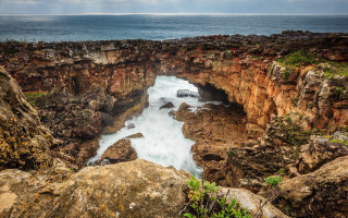 Rocky cliff river cloudscape landscape - a rocky cliff free wallpaper