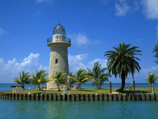 Lighthouse island palm trees water - a small island free wallpaper for desktop