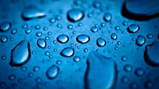 Water droplets blue surface macro 6 - a close up of water droplets free wallpaper for desktop