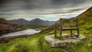 Wooden bench lake mountains green - a lush green hillside next free wallpaper