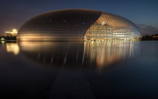 Large building lake night reflection - top of a lake free wallpaper