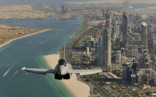 City beach ocean plane sky - colin middleton free wallpaper