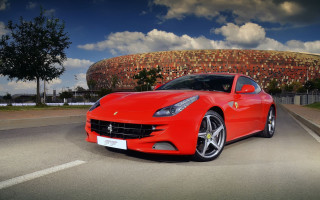 Red sports car building round - round free wallpaper