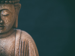 Wooden buddha statue closed eyes - ella guru free wallpaper