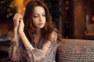 Woman sitting couch hands head 2 - a hand free wallpaper for desktop