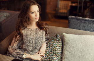 Woman couch pillow sitting relaxing - a pillow free wallpaper