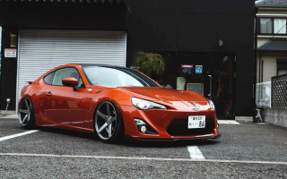 Red sports car garage japanese - a garage door free wallpaper