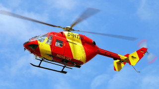 Red yellow helicopter blue sky - the deck free wallpaper