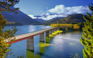 Bridge water mountains clouds autumn - a bridge over a body of water free wallpaper for desktop