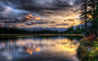 Lake forest mountains cloudy sky - a mountain in the distance free wallpaper