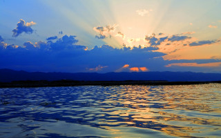 Sunset lake mountains clouds sky 3 - cloud and sun rays free wallpaper