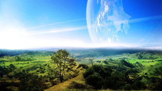 Green landscape blue sky distant 3 - a green landscape free wallpaper