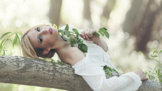 Girl leaf holding vines outdoors - a green plant free wallpaper for desktop