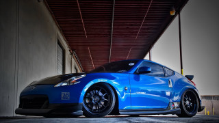Blue sports car garage open - rim free wallpaper
