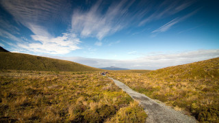 Dirt road motorcycle cloudy horizon - a dirt road free wallpaper for desktop