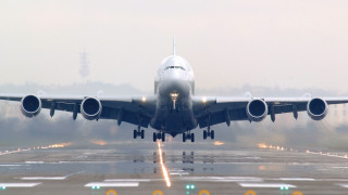 Jetliner takeoff fog night tiltshift - an airport runway free wallpaper