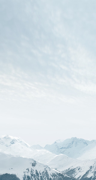 Person on skis snowy mountain 3 - a snowy mountain top free wallpaper