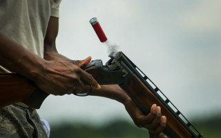 Man gun red handle headshot - a red handle free wallpaper