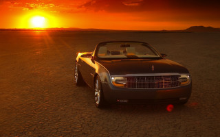 Desert sunset car redball mountain - the middle of a desert free wallpaper