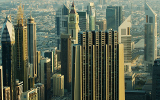 City skyline clock tower urban - a large city in the background free wallpaper