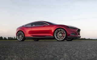 Red sports car evening sunshine - a red sports car free wallpaper