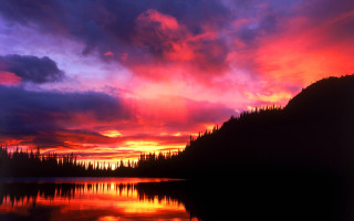 Sunset mountain trees lake purple - the background and a lake in the foreground free wallpaper