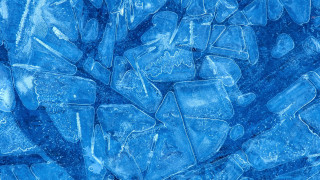 Ice cubes water droplets blue - a table top free wallpaper