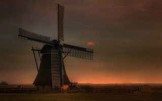 Windmill red sun fence field - a red sun in the background free wallpaper