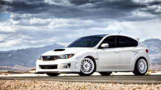 White car mountains clouds beach - andrew bell free wallpaper