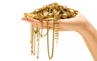 Person holding gold jewelry chains - chain free wallpaper for desktop