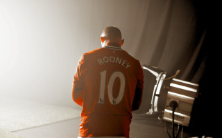 Man orange jacket standing room - the window free wallpaper for desktop