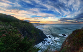 Cliff water sunset clouds nature - free landscape wallpaper