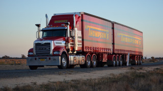 Semi truck desert sunset trailer - a road in the desert free wallpaper for desktop