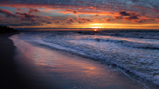 Sunset ocean waves beach dawn 3 - the beach in the distance free wallpaper