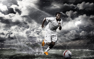 Man kicking soccer rain cloudy - a man kicking free wallpaper
